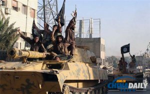 ئىراقتىكى رادېكال تەشكىلات سۇرىيەدە كۆرەك ئۆتكۈزۈپ، ئولجىلىرىنى كۆرگەزمە قىلدى