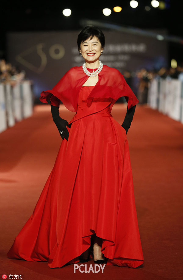Taiwanese actress Brigitte Lin poses on the red carpet at the 50th Golden Horse Awards in Taipei, Taiwan, Saturday, Nov. 23, 2013. Lin is a guest at this year's Golden Horse Awards, one of the Chinese-language film industry's biggest annual events. (AP Photo/Wally Santana)